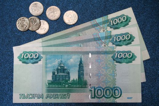 The Russian money for darkly dark blue background 