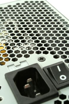 closeup power supply with lattice and switch button