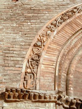 Detail of a door arch of Saint Francis church in Bologna