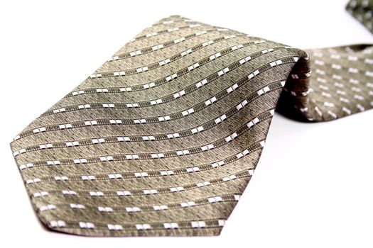 The bottom part of a tie of the businessman, isolated on white, (look similar images in my portfolio)