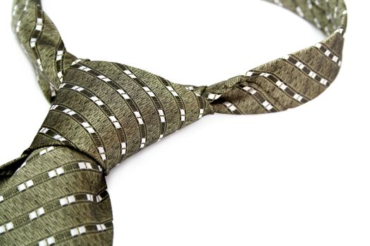 Tie with a simple pattern - a personal accessory of the businessman, isolated on white, (look similar images in my portfolio)