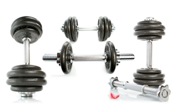 Iron dumbbells and feather  isolated on white 5