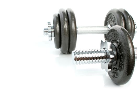 Iron dumbbells set solated on white