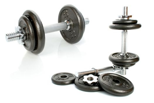 Iron dumbbells set solated on white 4