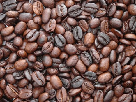 Background image of delicious freshly roasted coffee beans
