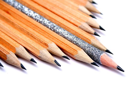 Celebratory pencil among usual pencils on a diagonal  4