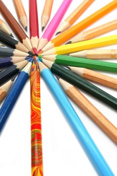 Color and simple wooden pencils have settled down around of the multi-colour leader