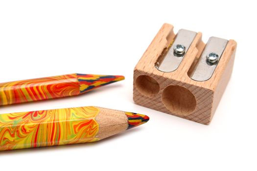 Two multi-coloured brother and double sharpeners for pencils 