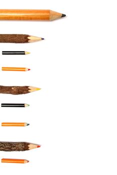 Bulleted list made of color pencils of the various size 1