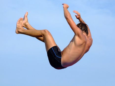 The falling guy on a background of the blue sky