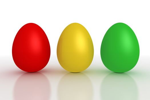 three shiny eggs ordered in a line - red, yellow, green