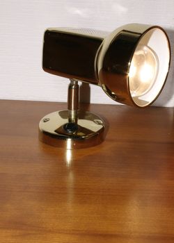 bedside lamp with the bulb lit
