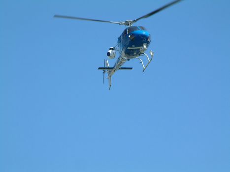 police helicopter searching from the skies