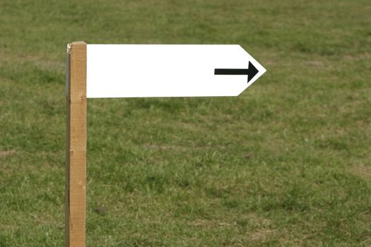 arrow on a board showing the direction