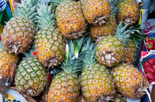 Box of Pineapple a a Farmers Market