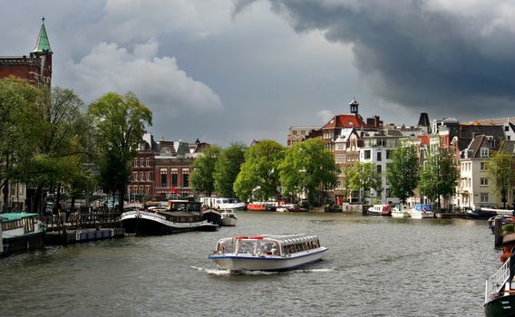 Tourboat in Amsterdam canal