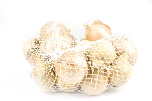 a rack with onions, isolated on a white background