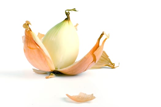 a peeled onion isolated on a white background