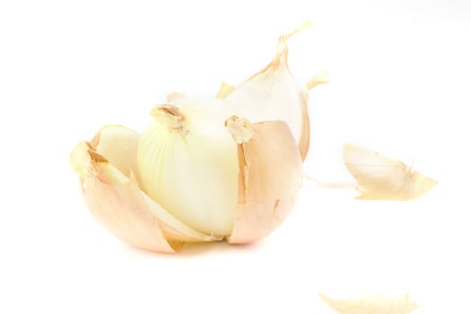 an peeled onion, isolated on a white background