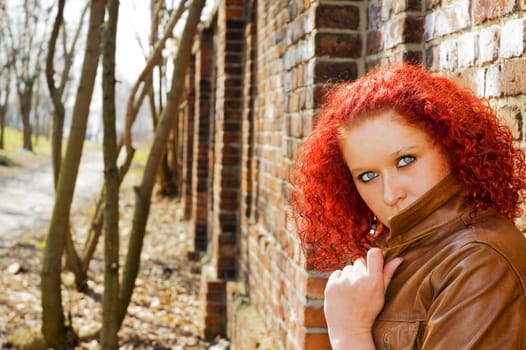 Woman is sheltered behind collar