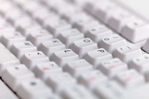 The gray classical computer keyboard close up