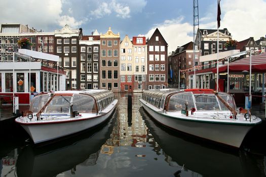 Tour boats and ticket office in Amsterdam canal