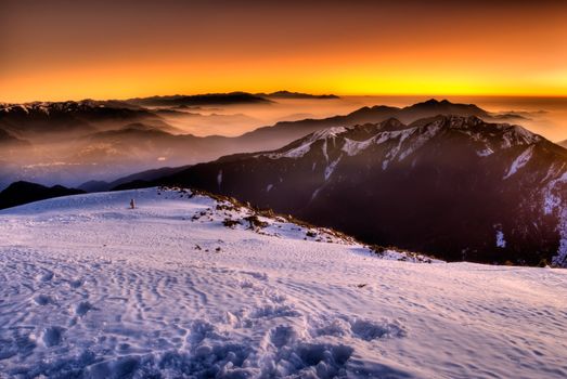 Color nature scenic of snow mountain sunrise.