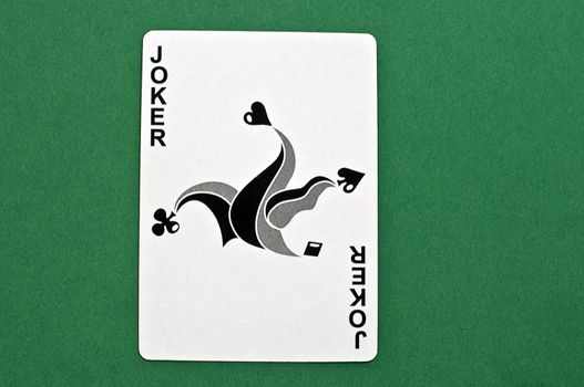 wild card in black and white on green background