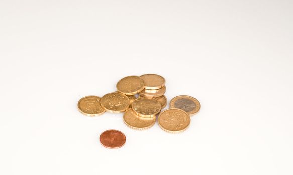 coins of different values on a white background