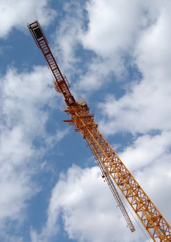 Tower crane in the clouds