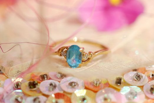 Ring with blue topaz