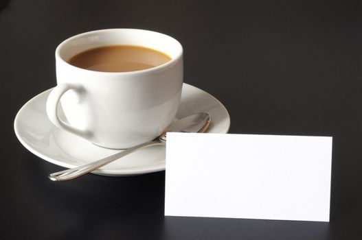 cup of coffee and blank or empty paper with copyspace