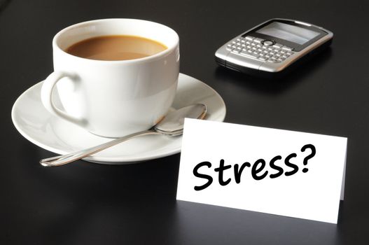 stress in business office concept with cup of coffee on black background