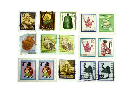 Colorful japanese historic stamp collection in white background