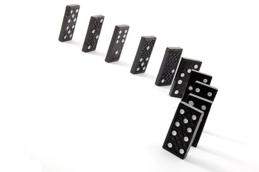 chain of dominoes isolated on a white background