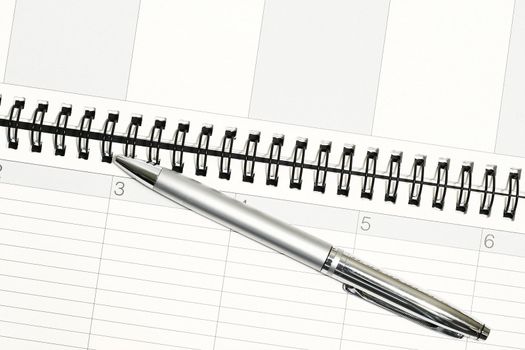 pocket Planner with  pen with dates concept