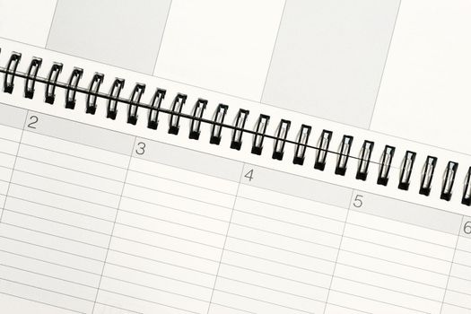 Open Spiral Notebook with  dated and calendar concept