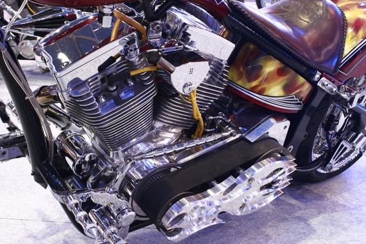 Close-up of latest motorcycle parts in a car show