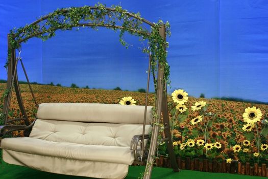 Very Relaxing Scene with swing and sunflowers