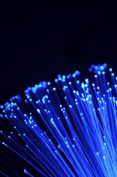 abstract information technology background with fiber optics