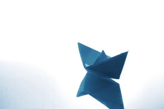 paper ship or boat showing concept for global economy