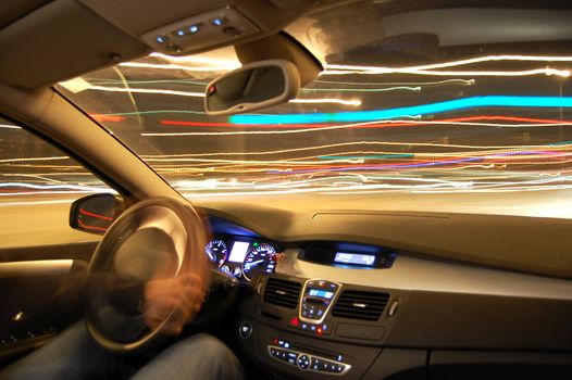 speed car at night in motion with traffic