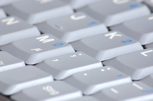 gray keyboard of a business laptop computer