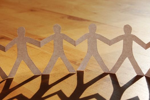 paper man showing concept for business teamwork and love
