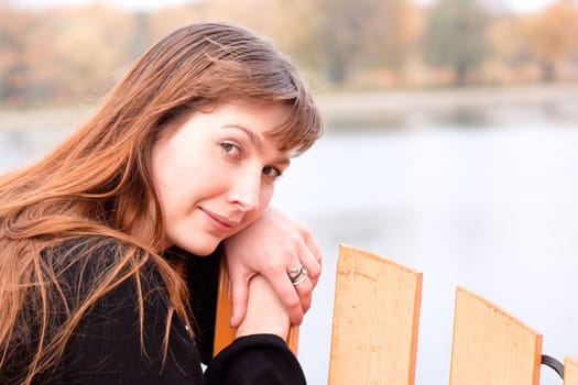 Portrait of  lady in black dress in the park
