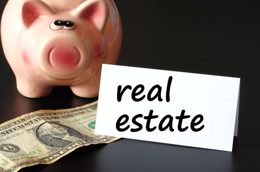 save money for real estate in your piggy bank