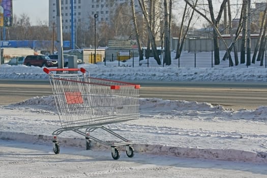 The street is empty trolley for products from the store.