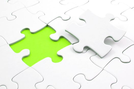 blank and white puzzle with missing piece