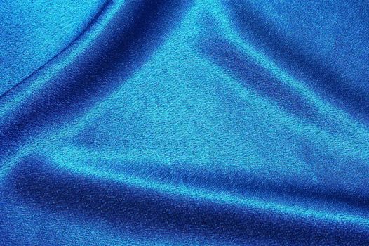 blue satin or silk background with textile texture