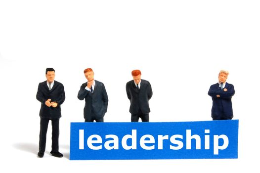 leadership or leader concept with business man and board isolated on white background
